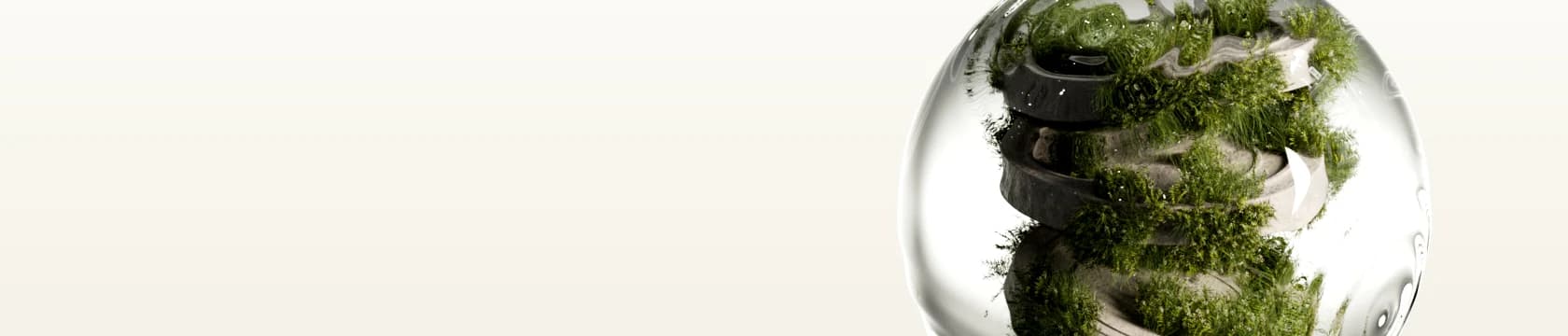 A glass orb cradling a terraced, greenery-covered landscape